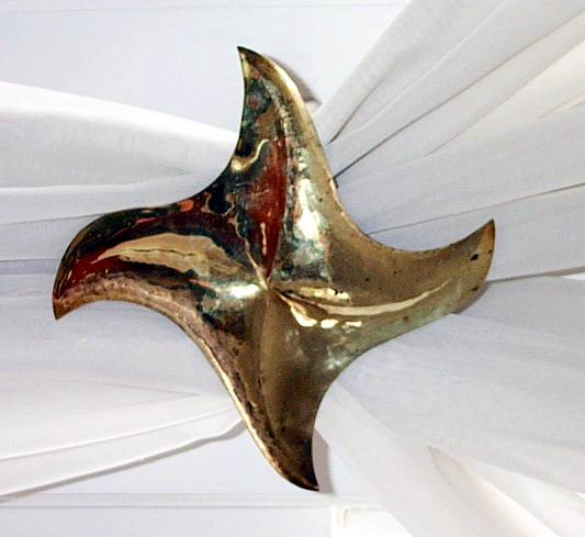 Brass starfish curtain hold-back