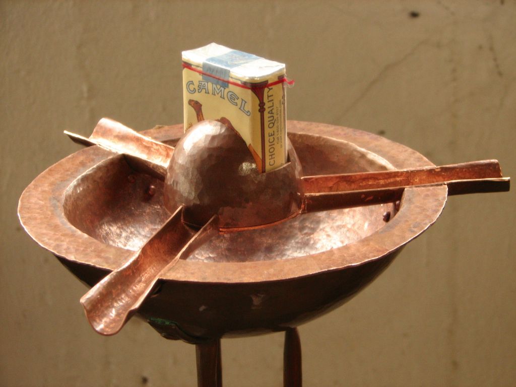 Restoration of 1920s Cigar/cigarette stand and ashtray (detail with cigarette pack