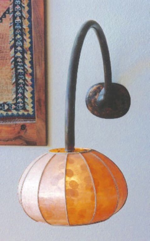 Wall mounted lamps in copper tubing.