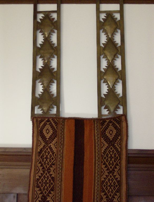 Decorative fabric hanger in copper