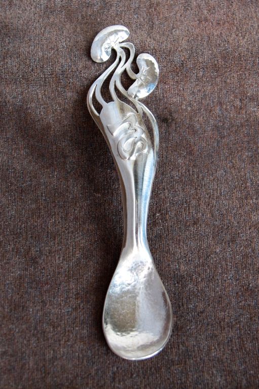 Sterling silver spoon with monogram and decoration