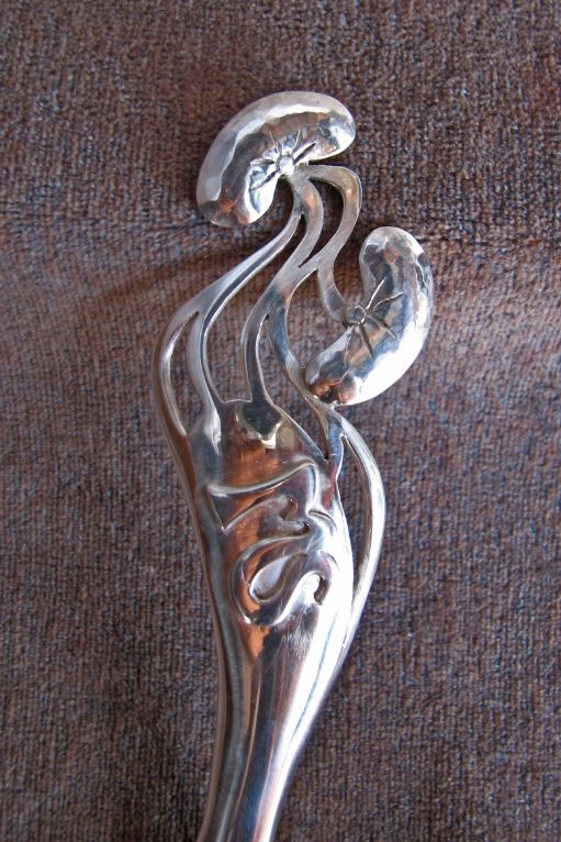 Sterling silver spoon with monogram and decoration