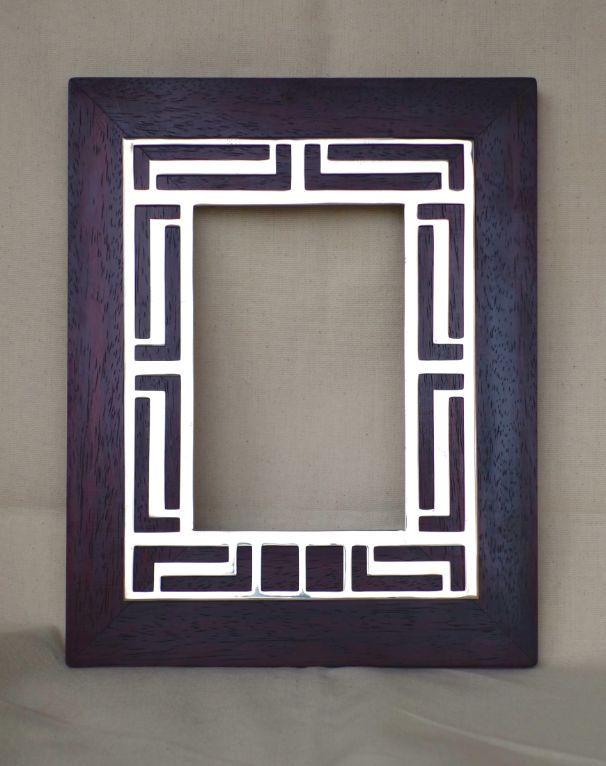 Nickel and rosewood picture frame