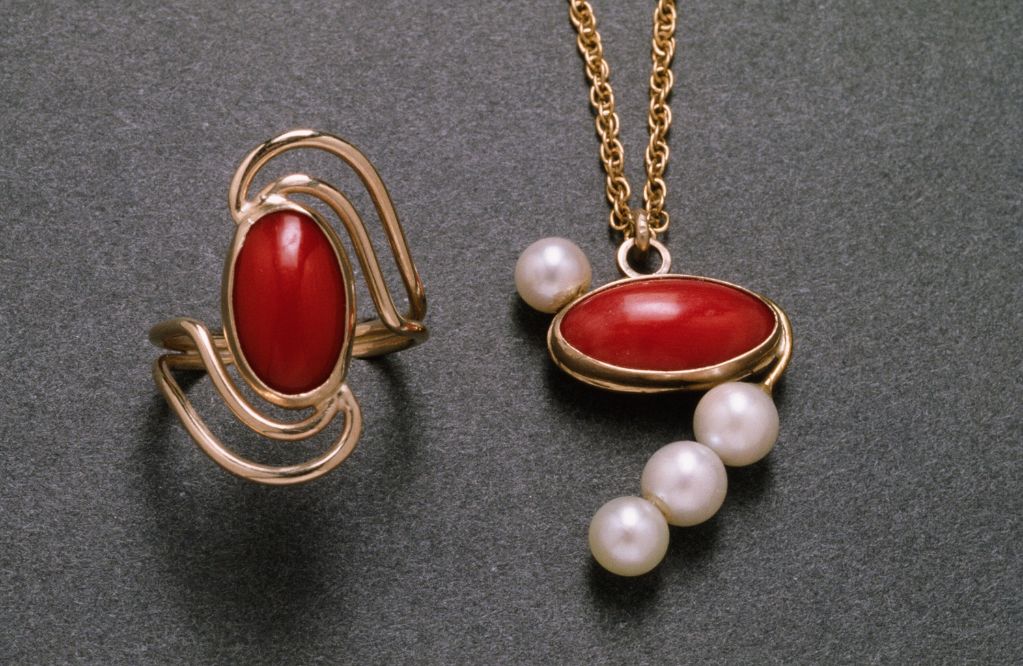 Left: Coral 14Kt wire; right: 14Kt gold, coral and pearl pendant