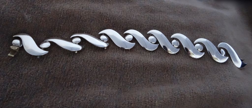 Silver Bracelet with hinged silver discs