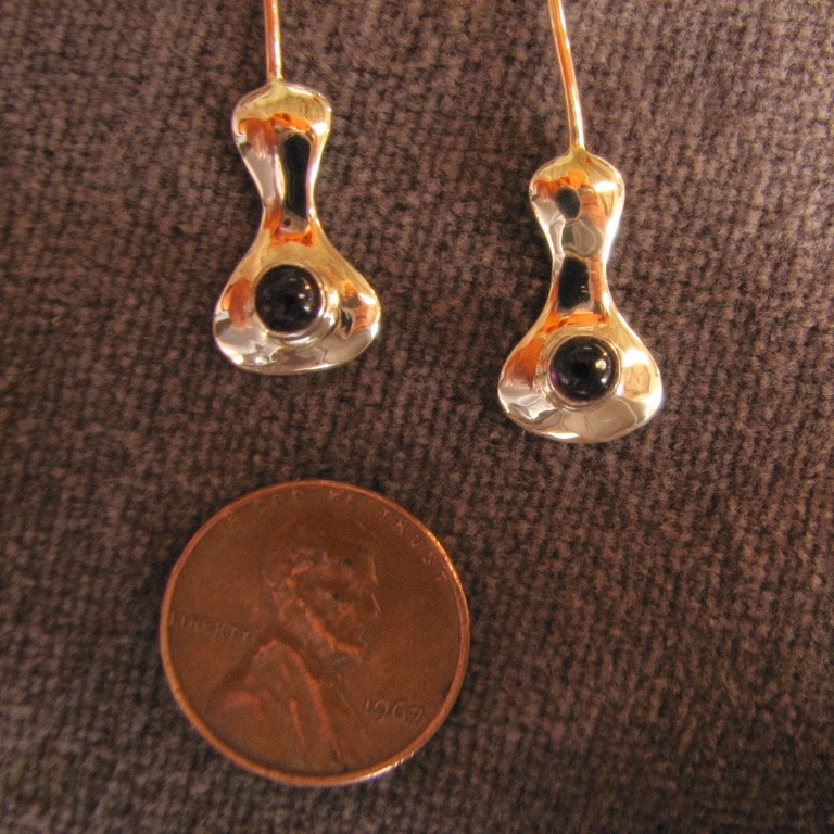 Earrings in silver and amethyst (penny for scale)