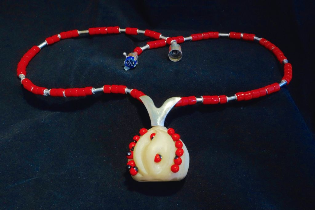 Pendant in silver with Zambian good luck beads and vegetable ivory (illuminates from inside)