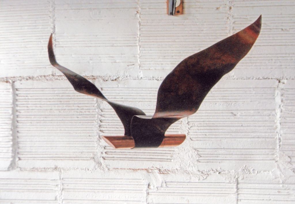 Copper urn with wings